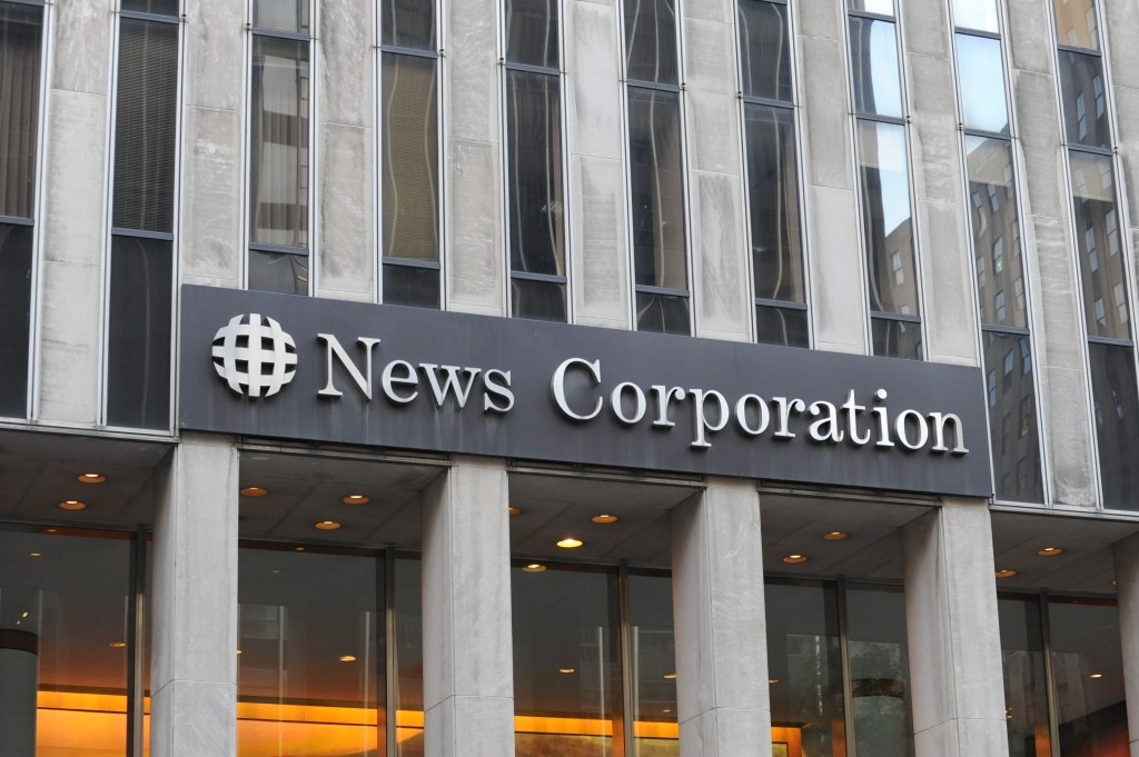 News Corp had a 6% rise in fourth-quarter revenue, partly due to strength in its Dow Jones business unit.